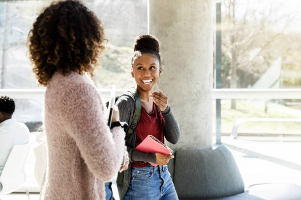 istock Friends walking to class together 1212021542