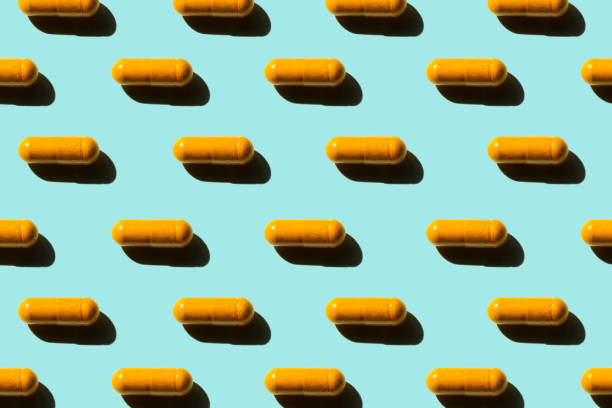 pattern of orange pills on blue background
