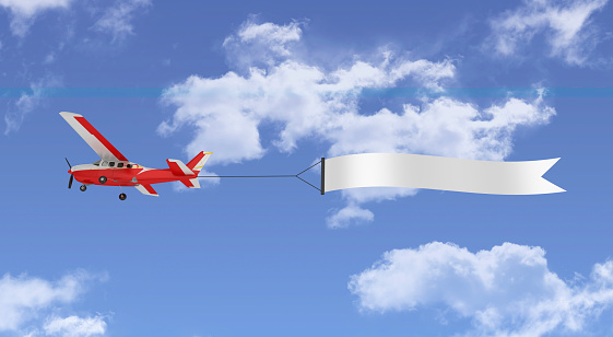 Airplane with Blank Banner - 3D Rendering