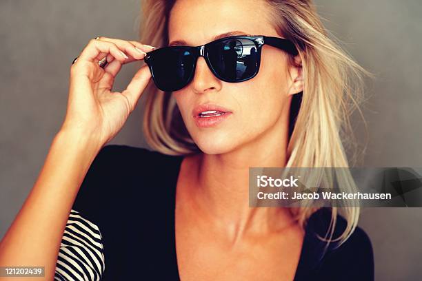 Portrait Of Pretty Young Female In Sunglasses Stock Photo - Download Image Now - 20-29 Years, Adult, Attitude