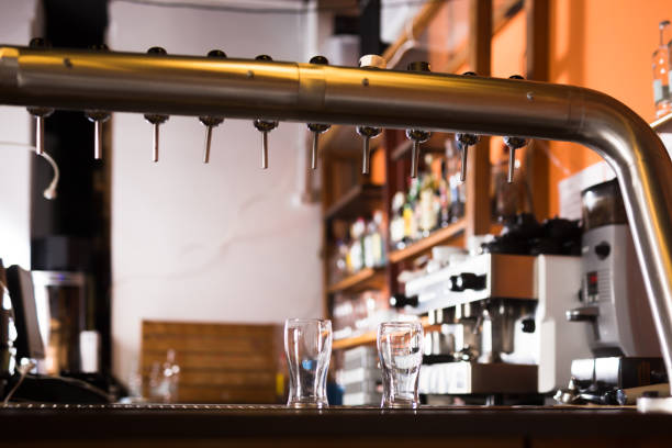 istock Image of modern beer bar with  metal beer taps 1212024545