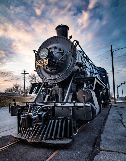 Nose and cow-catcher of an antique steam locomotive at Reading's Outer Station at dawn