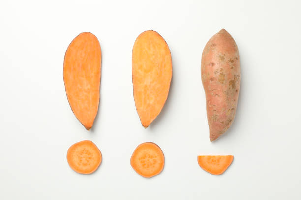 istock Flat lay with sweet potato on white background, top view 1212025790