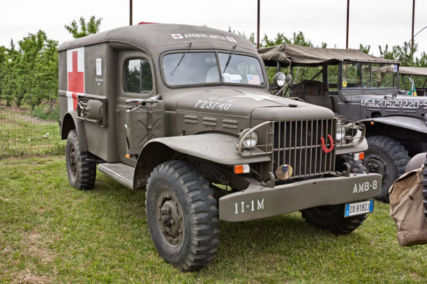 Classic Dodge WC-54 Ambulance used during the World War II exposed in meeting of military vehicles The Column of Liberation in Zello di Imola, BO, Italy - April 29, 2012