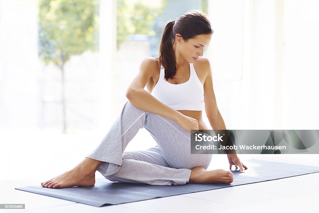 Young female doing yoga exercise  20-24 Years Stock Photo