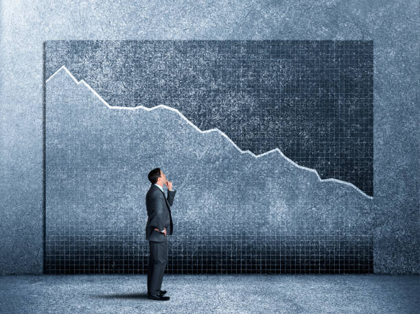 istock Businessman Looking Up At Bear Market Chart 1212028102