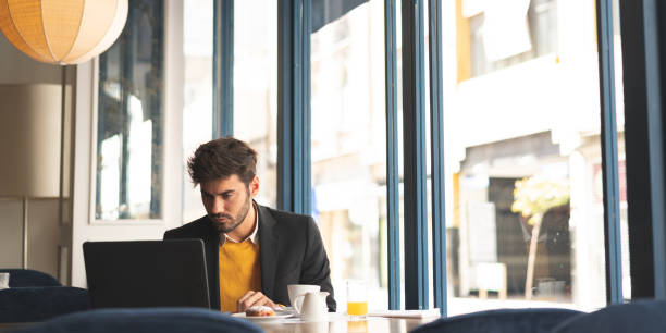 Man watching the news over the internet