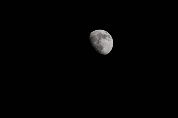 istock Closeup of a Full Moon in a Black Sky 1212029563