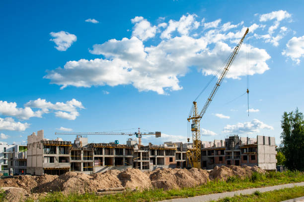 istock Residential building under construction on a sunny summer day 1212031238
