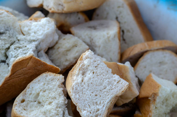 istock Dry slices of wheat bread with mold. 1212031562