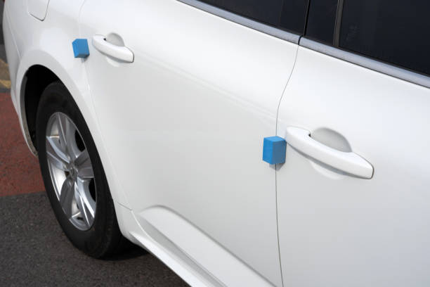 istock White Car's Door and Foam Protector. 1212032697