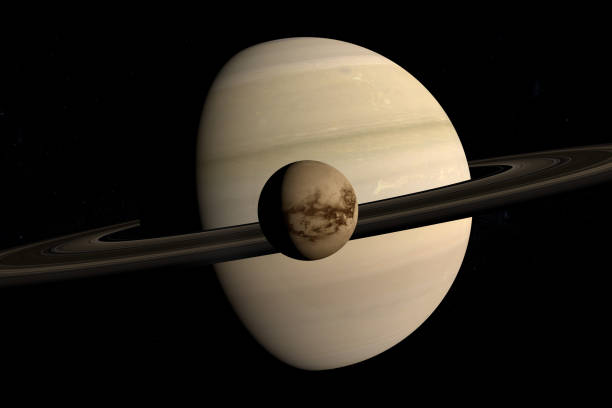 istock Titan, Saturn moon, rotating and orbiting around Saturn planet. 3d render 1212035612