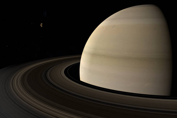 istock Satellite Titan rotating and orbiting around Saturn planet. 3d render 1212035647