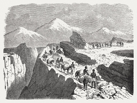 Convoy across Inca road. The Inca road system was the most extensive and advanced transportation system in pre-Columbian South America. It was at least 40,000 kilometres (25,000 mi).In modern times the roads see heavy use from tourism. Wood engraving, published in 1888.