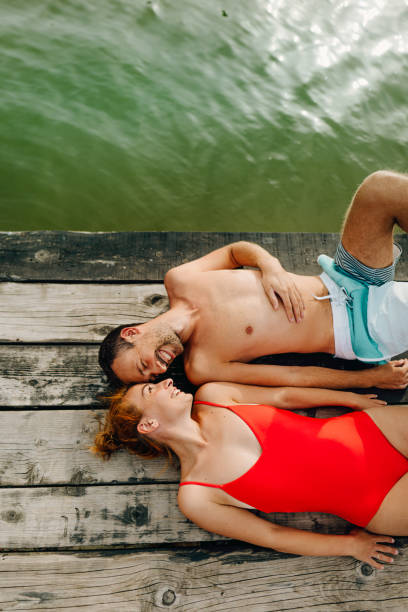 Loving couple on a lake