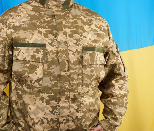 istock Ukrainian man a warrior dressed in a military pixel uniform 1212040749
