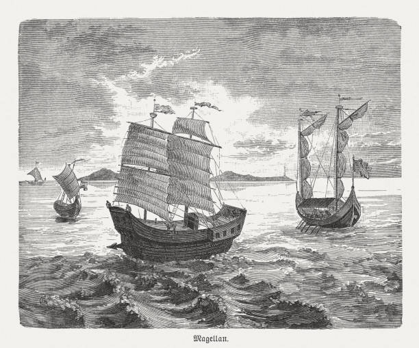 Magellan's ships, wood engraving, published in 1888 Ships of the Ferdinand Magellan (1480 - 1521) - Portuguese navigator who sailed on behalf of the Spanish crown. Magellan began the first circumnavigation of the globe, but could not finish them personally, as he was killed while traveling. Wood engraving, published in 1888. round the world travel stock illustrations