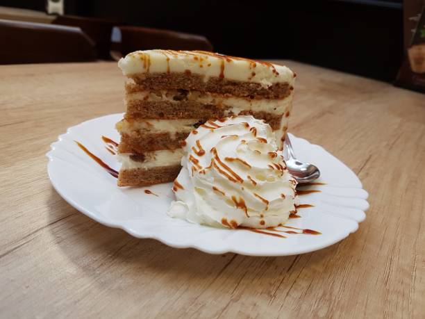 istock PORTION OF CARROT CAKE 1212048279