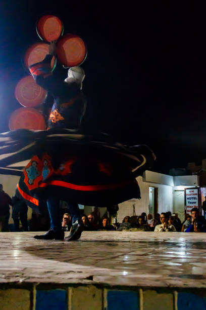 Konya, Turkey - December 15, 2006: The 'dance' of the Whirling Dervishes is called Sema and is a part of the inspiration of Mevlana and has become part of Turkish custom, history, beliefs and culture. This image has been captured in cultural center of Konya municipality during a sema festival called \