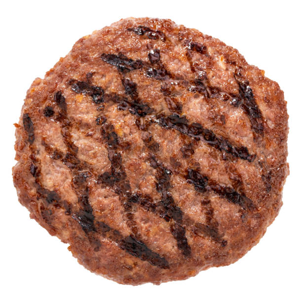 istock grilled burger meat isolated on white background, top view 1212052783