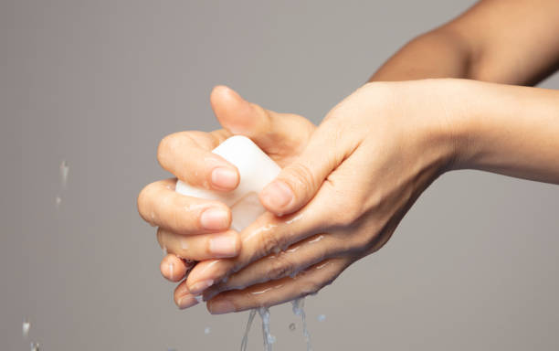 istock She washing her hands with soap for 
decontamination 1212053851
