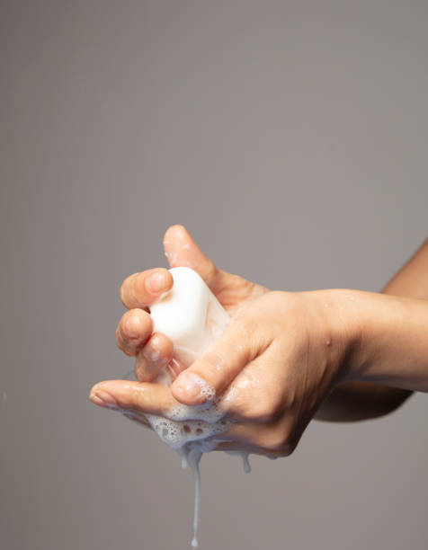 istock Young Woman Washing Hand 1212057451
