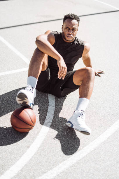 istock basketball player resting in the court 1212057535