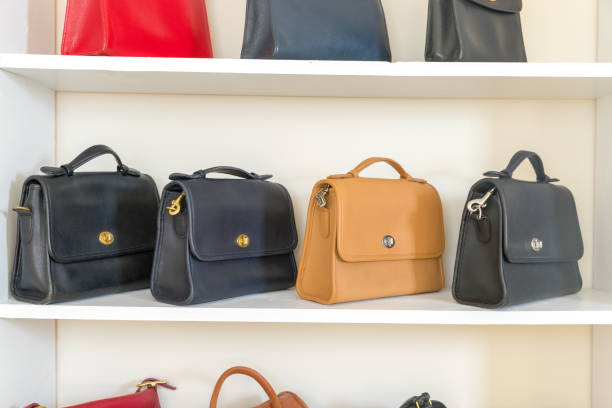 istock Vintage bag on the white shelf 1212058660