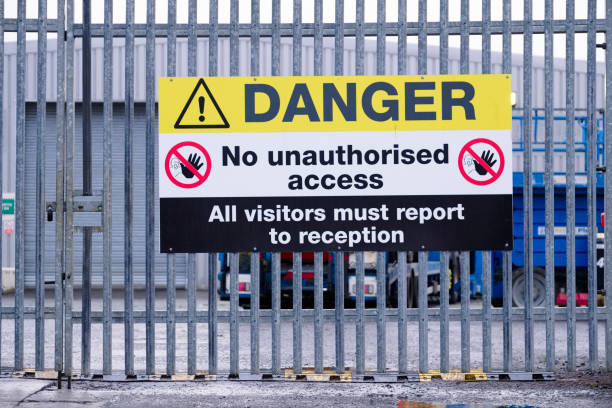 istock Danger no unauthorised access, all visitors must report to reception sign 1212061225