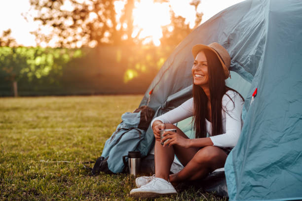 istock Young woman enjoying spending time in camp. 1212062334