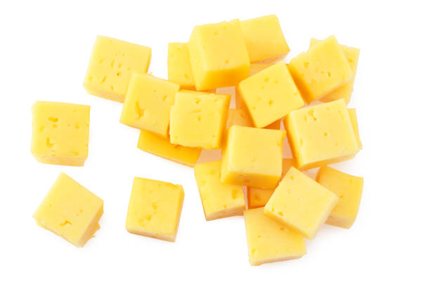 istock Cut of cheese isolated on a white background. top view 1212062595