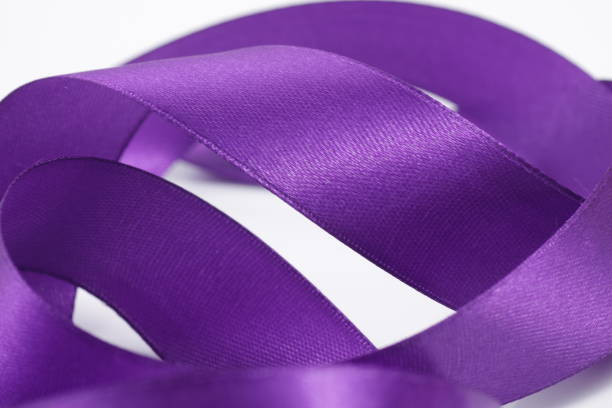 istock Abstract defocused purple satin ribbon for background 1212068138
