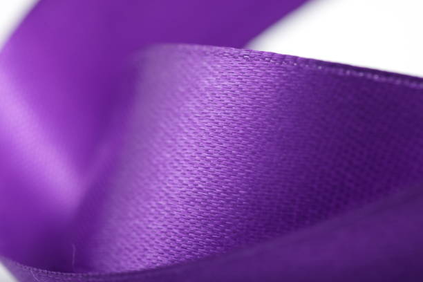 istock Abstract defocused purple satin ribbon for background 1212068195
