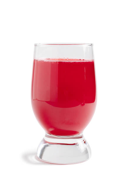 glass of cranberry juice isolated on a white phones with clipping paths with shadow and without shadow - cranberry juice imagens e fotografias de stock
