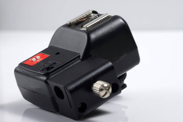 istock Close up shot of black camera flash trigger isolated on white background 1212069505
