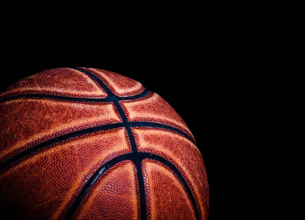 istock basketball ball on black background. 1212071108