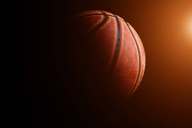istock basketball ball on black background. 1212071109