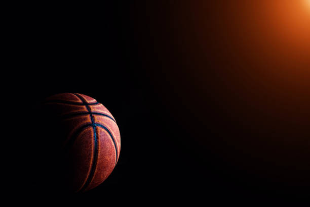 istock basketball ball on black background. 1212071110