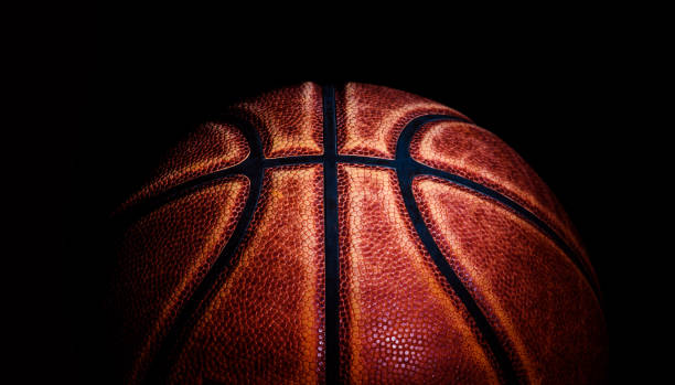 istock basketball ball on black background. 1212071112