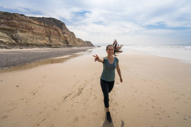 istock Young Hispanic Women On Torrey Pines State Beach 1212075321