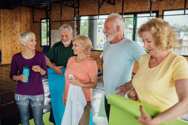 istock Group of older people having fun after the yoga class 1212075388