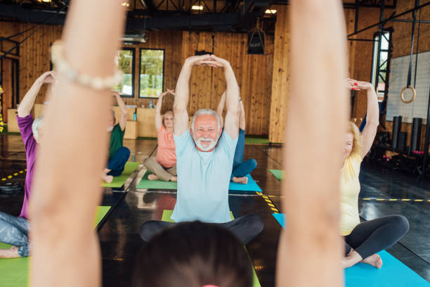 istock Relaxing yoga for older people 1212075413
