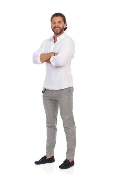 istock Smiling Standing Man With Arms Crossed. Front Side View. 1212077094