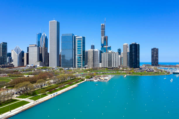 Aerial Skyline View of Chicago Chicago, Illinois, cityscape with Grant Park and S Lake Shore Drive with car traffic, aerial view. grant park stock pictures, royalty-free photos & images