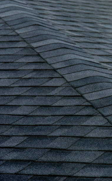 istock Grey shingled roof closeup 1212087110