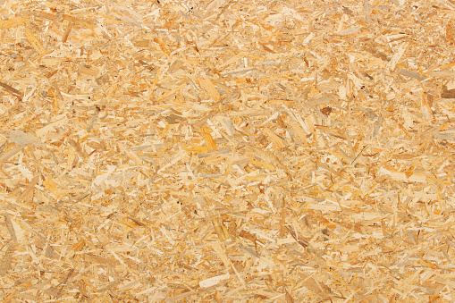 Recycled compressed wood chippings board