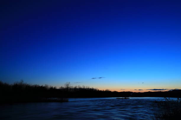 istock dramatic sunset in river and moutain,in Japan 1212088875
