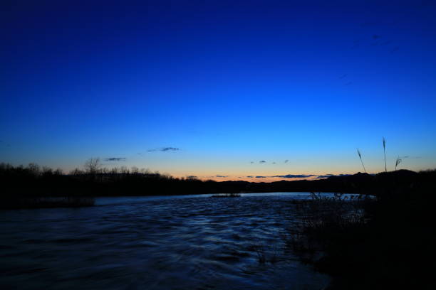 istock dramatic sunset in river and moutain,in Japan 1212088896