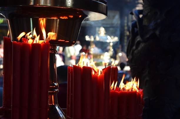 Candles and censer at the popular Longshan Temple in Taipei, Taiwan