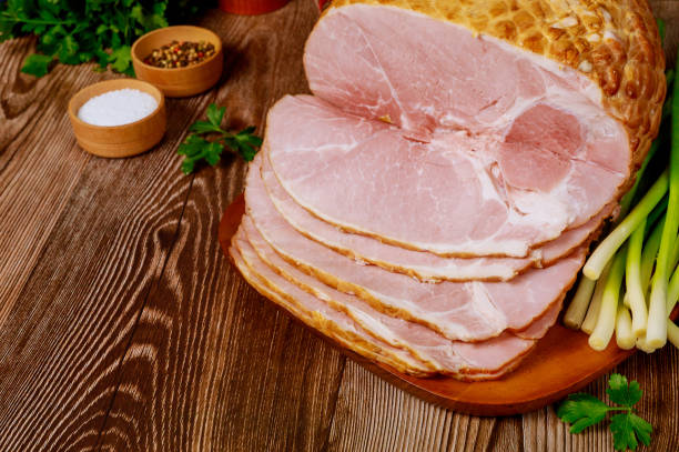 istock Whole sliced ham with radish, scallion and salt. 1212096234